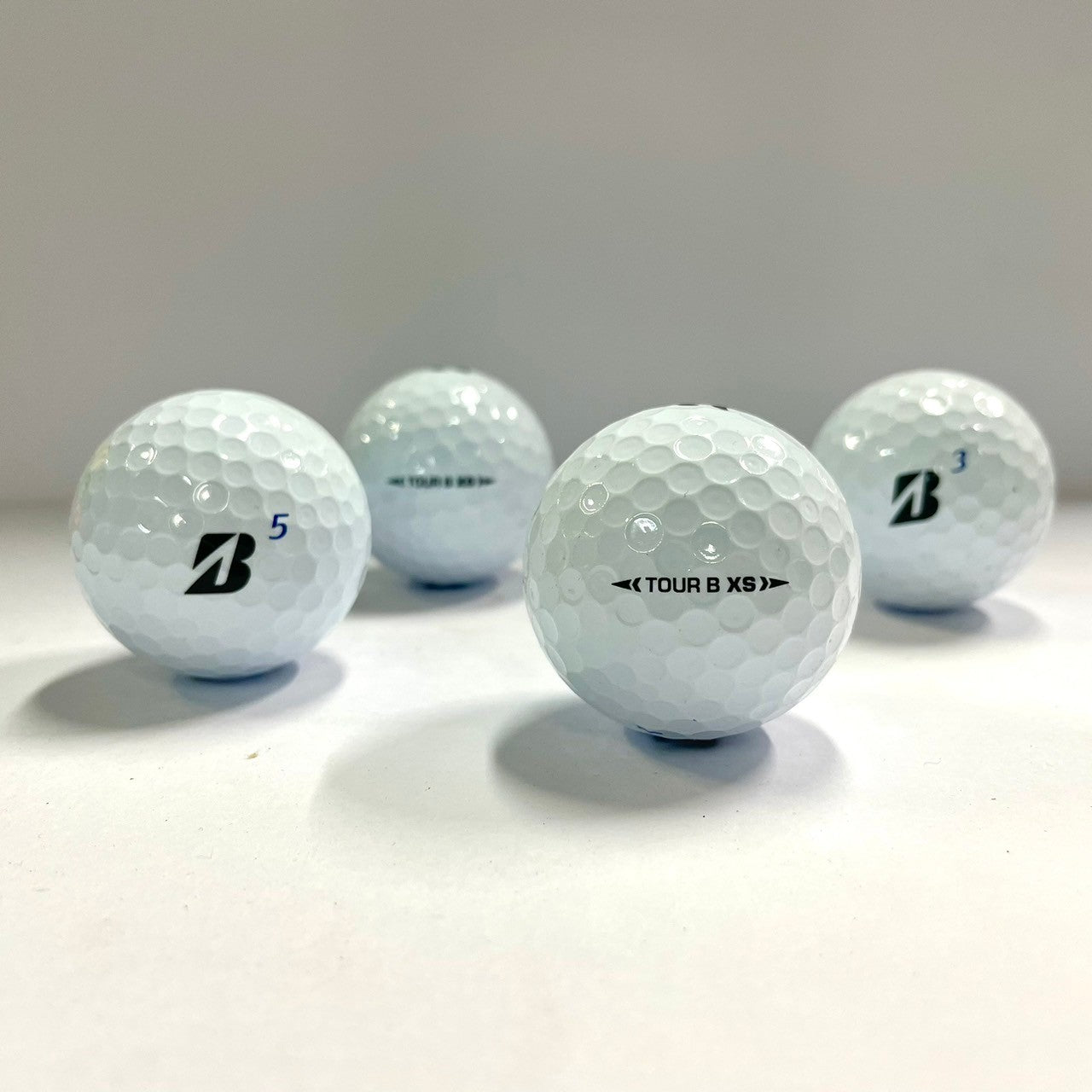 ロストボール ブリヂストン BRIDGESTONE TOUR B XS 年代混合 ホワイト 20球 【ABランク】 ゴルフボール 【中古】