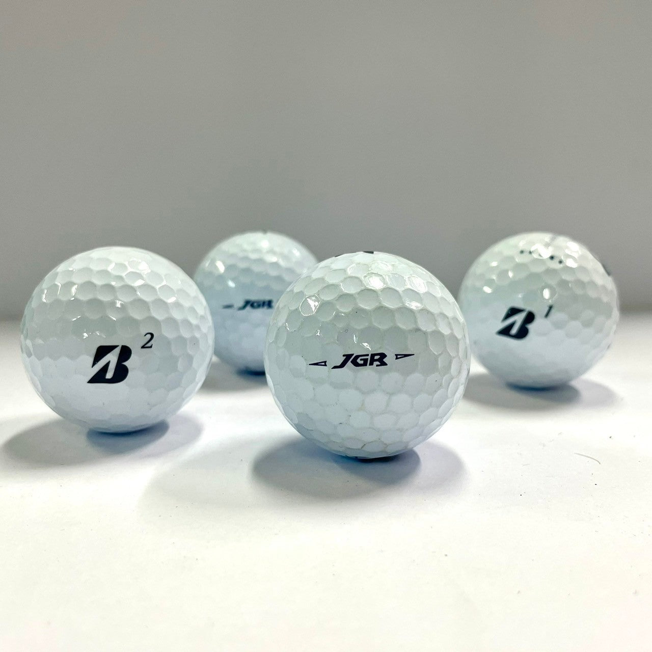 ロストボール ブリヂストン ツアーB JGR 年代混合 ホワイト系 12球 Aランク 中古 ゴルフボール エコボール